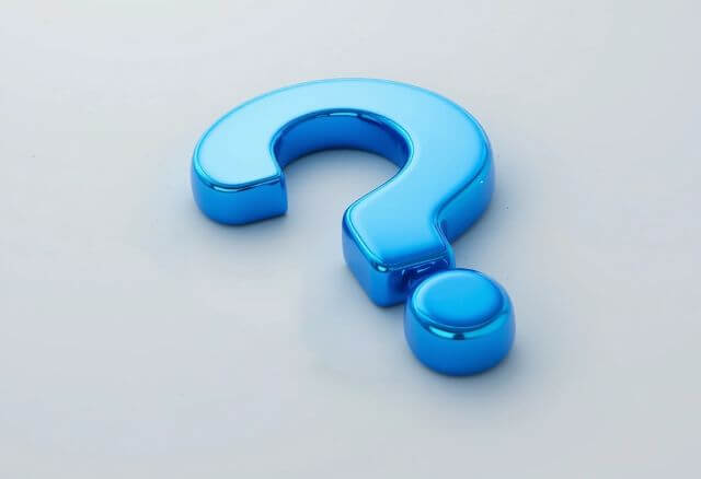 床に置かれた青いハテナマーク